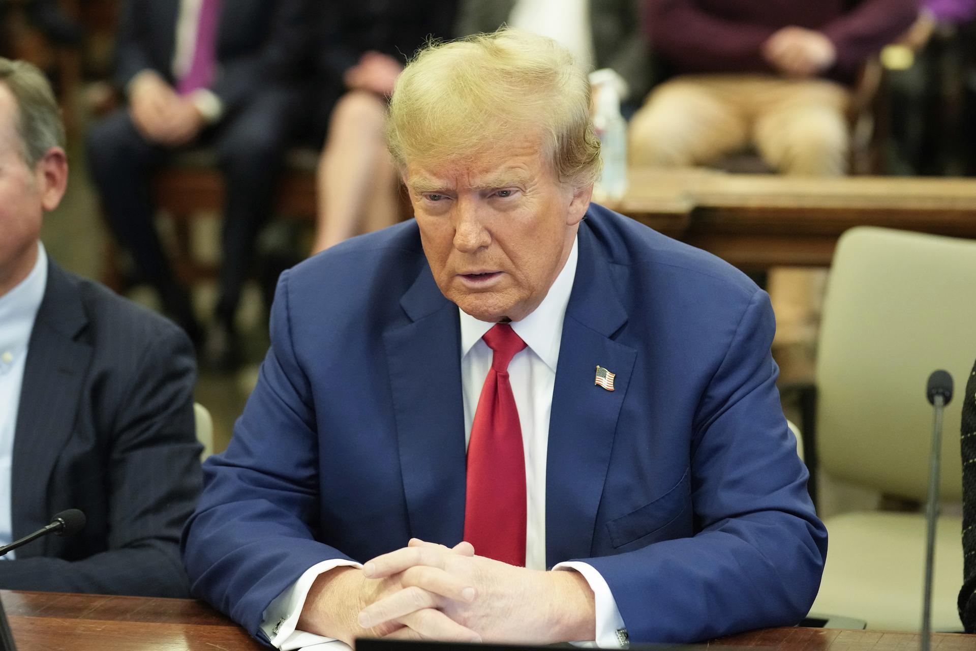 President Donald Trump sits in the courtroom before the start of closing arguments in his civil business fraud trial Jan. 11, 2024, in New York. (AP Photo/Seth Wenig, Pool)