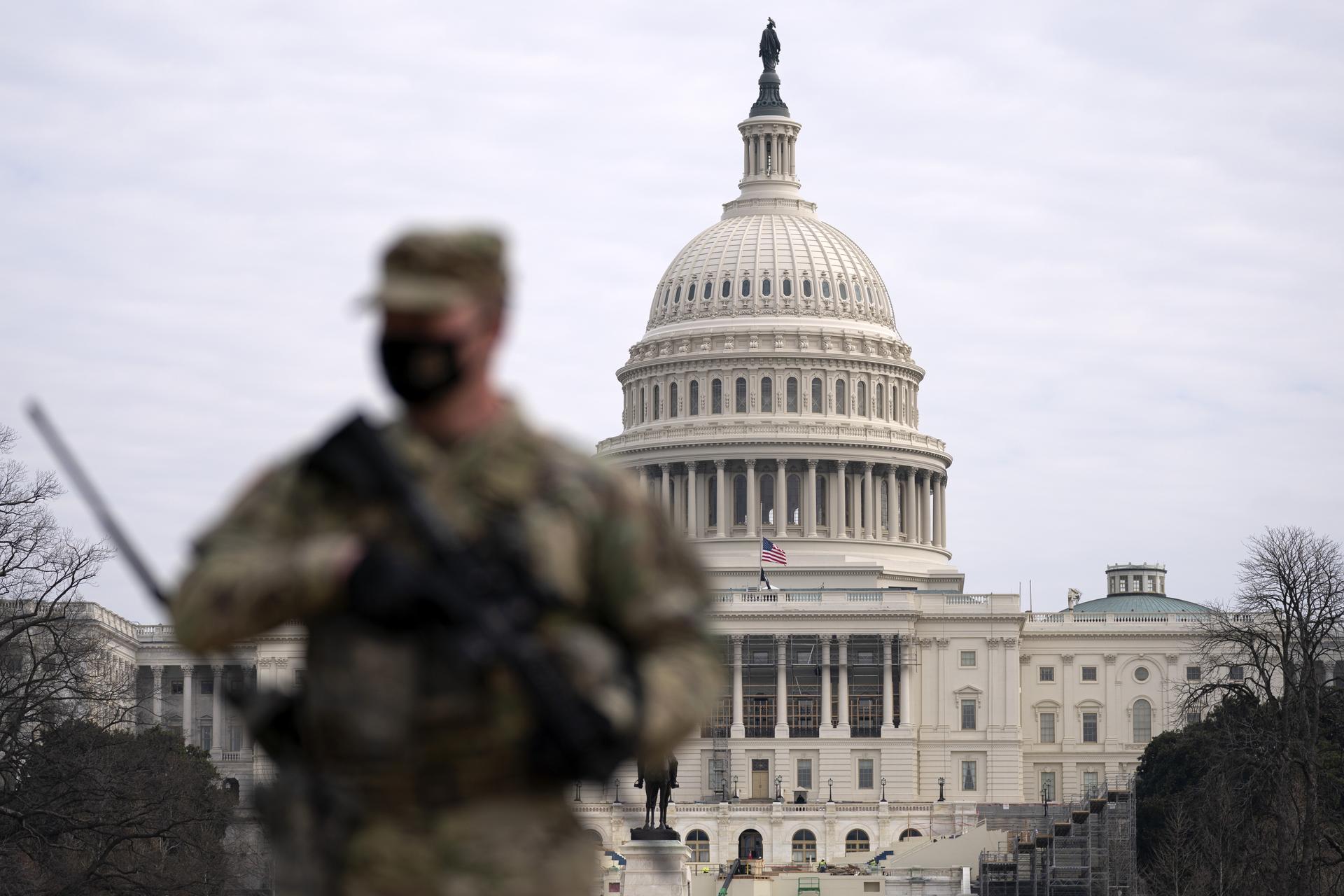 A member of the National Guard patrols the area outside of the U.S. Capitol in Washington, Feb. 10, 2021. (AP Photo/Jose Luis Magana)