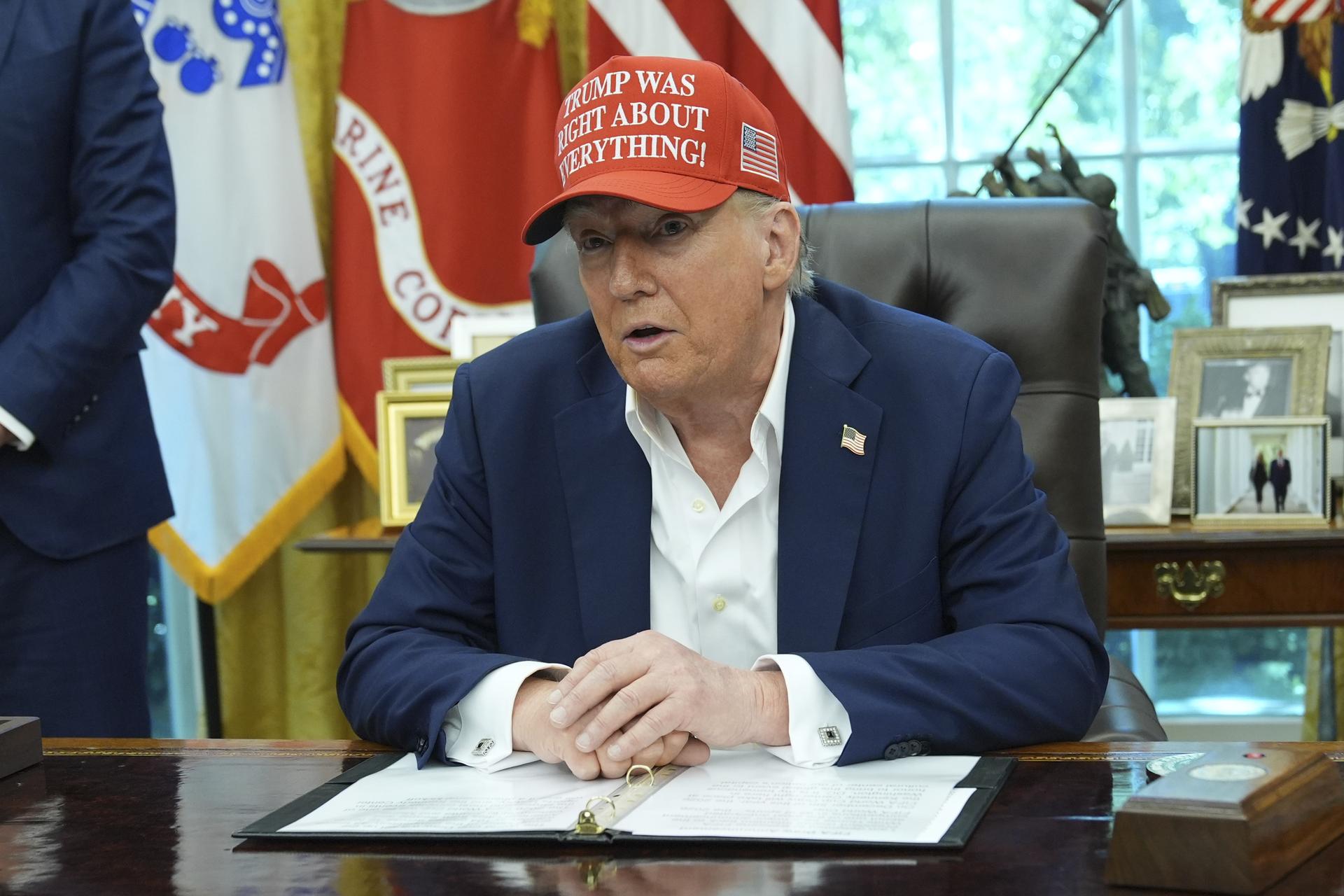 President Donald Trump speaks in the Oval Office of the White House on Friday. (AP Photo/Jacquelyn Martin)