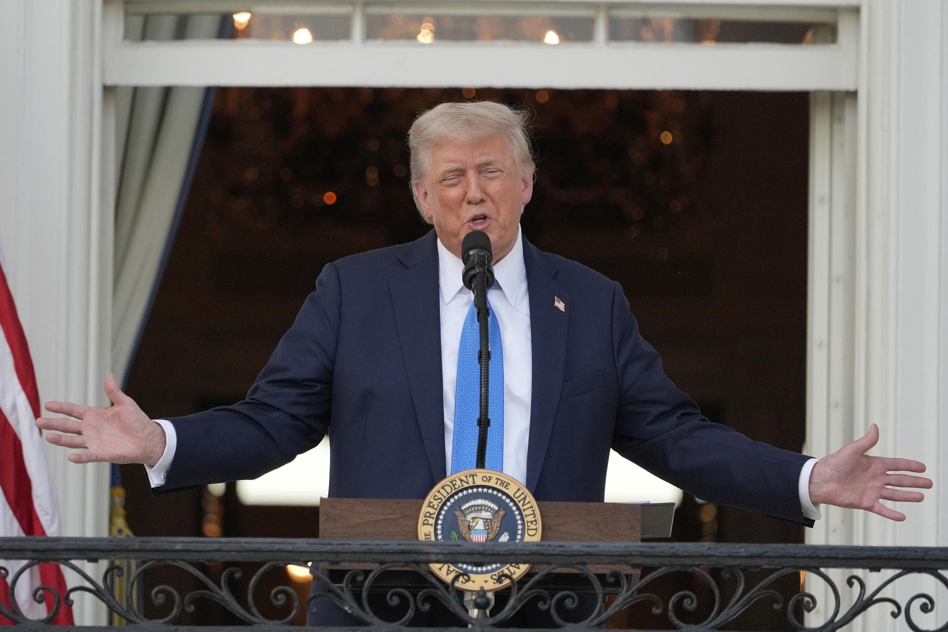 President Donald Trump speaks during a summer soiree on the South Lawn of the White House, Wednesday.