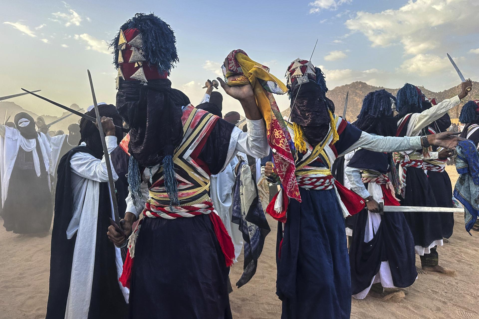 Zelouaz, Algeria dancers perform at the Sebeiba festival in Djanet, a southeastern Algerian oasis town in the Sahara desert, on July 6.