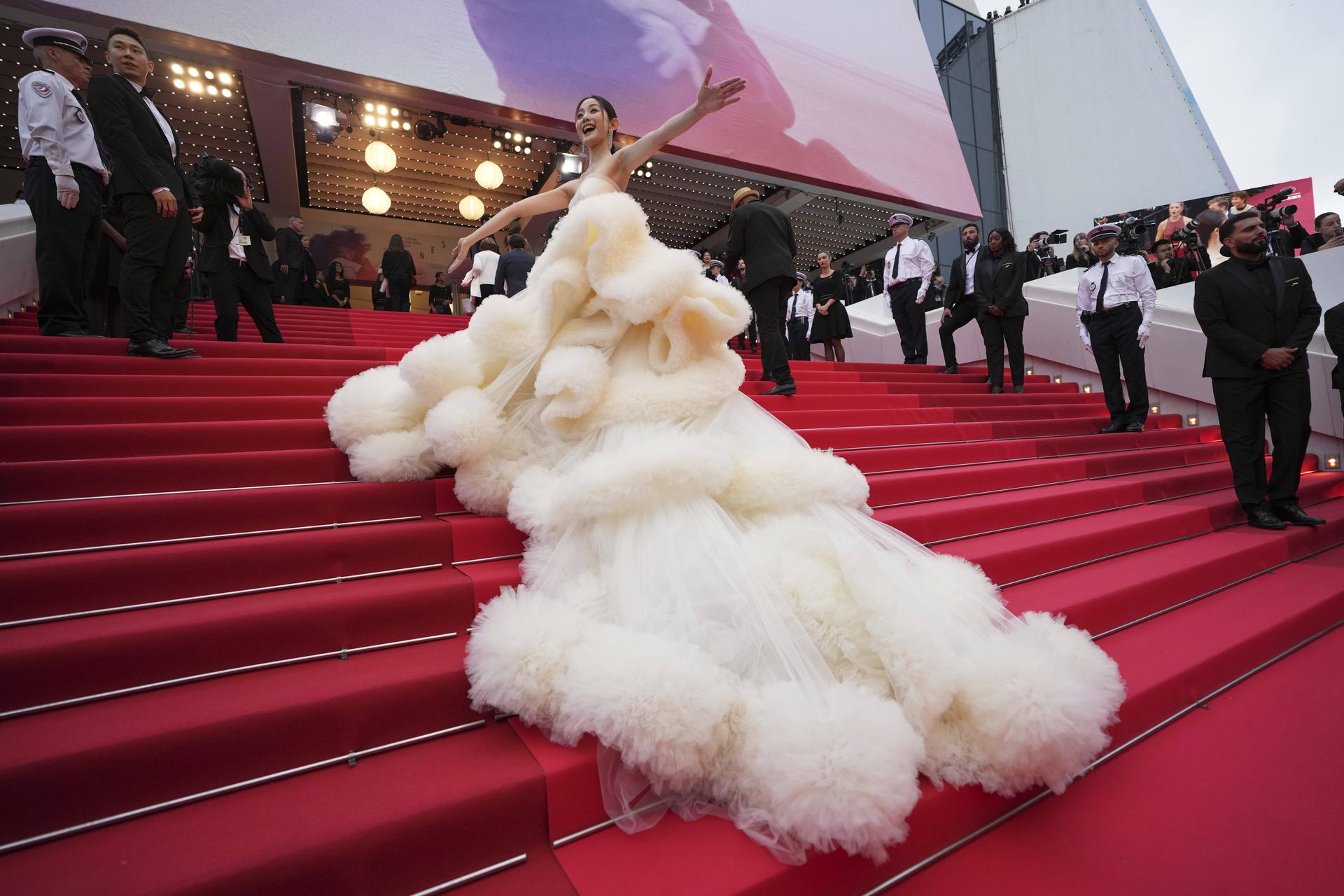 Wan QianHui poses for photographers on the red carpet of the 78th international film festival, Cannes.