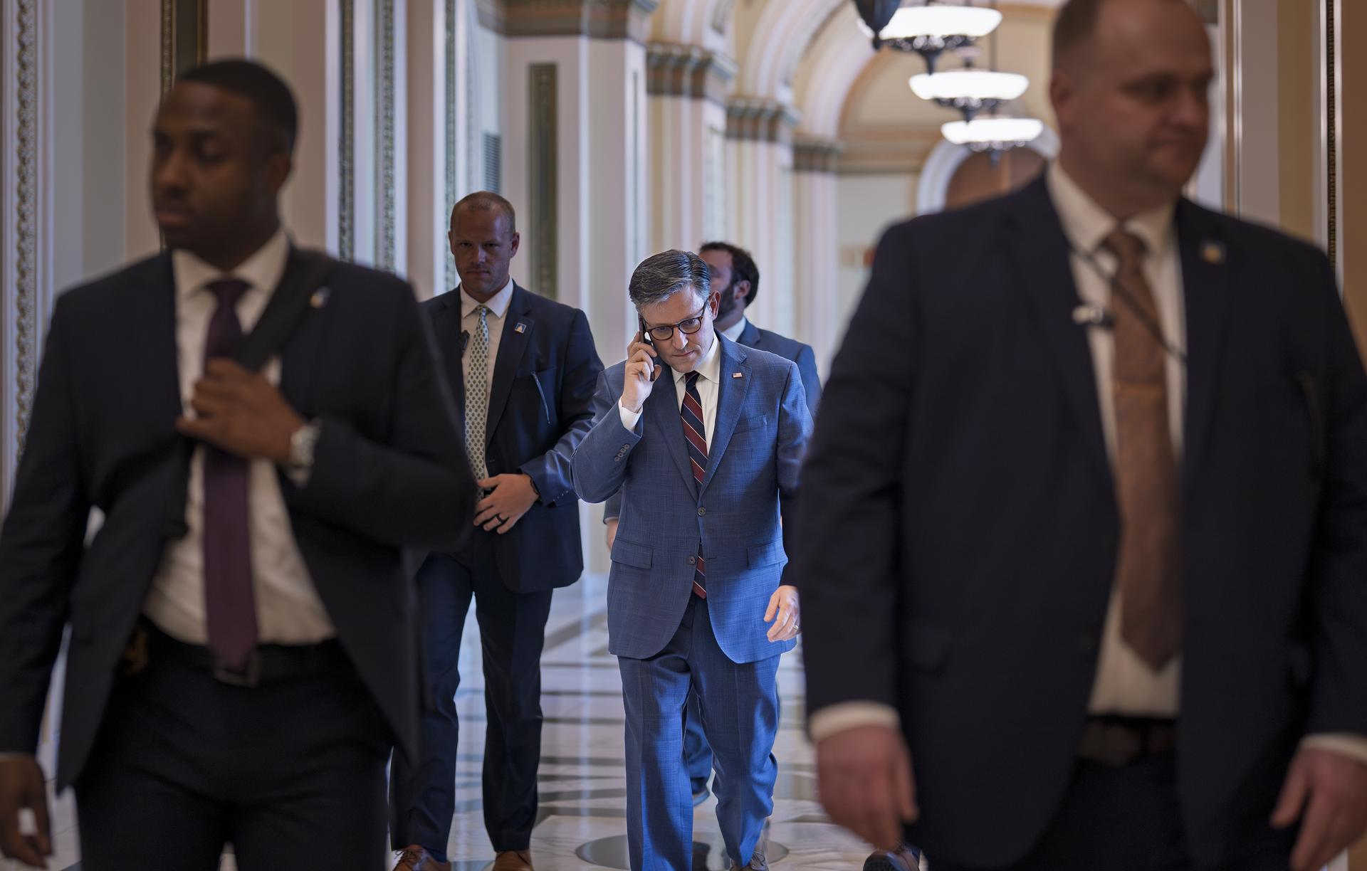Speaker of the House Mike Johnson leaves the chamber at the Capitol in Washington, Thursday. 