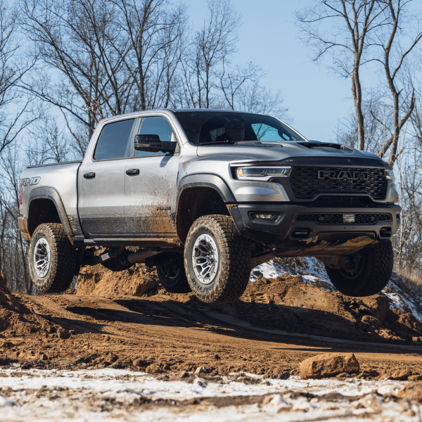 Silver Ram driving through the mud Silver Ram driving through the mud