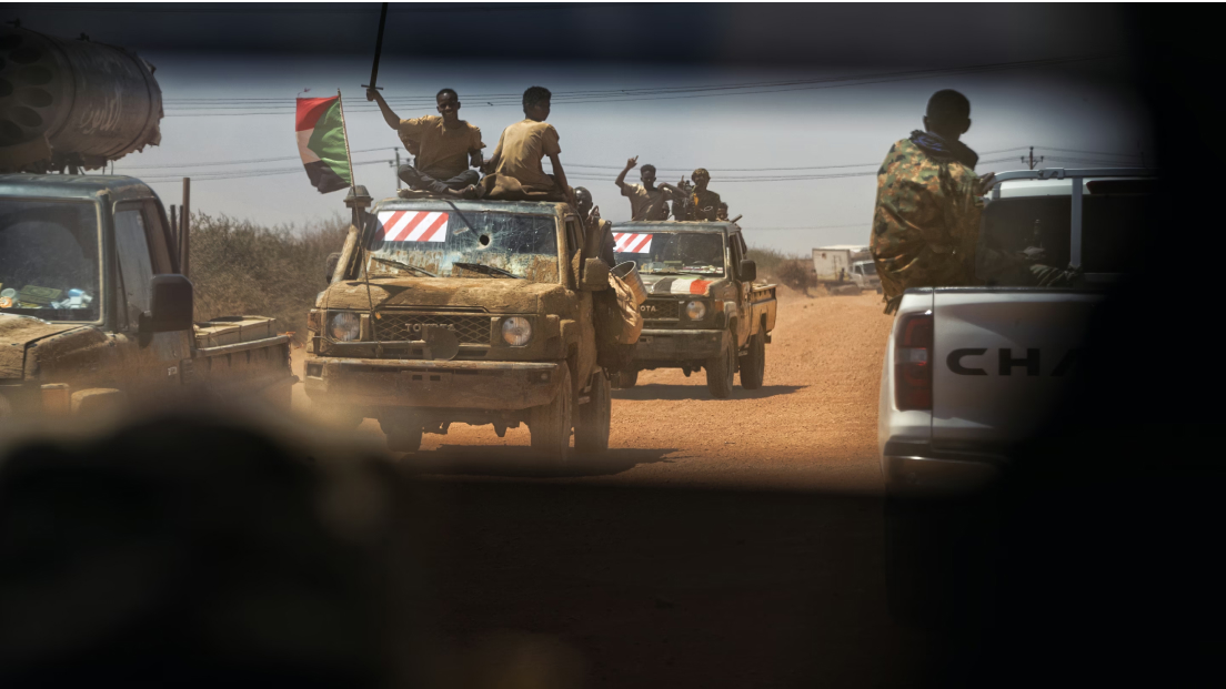 Soldiers with the Sudanese Armed Forces return from the front line in Khartoum.