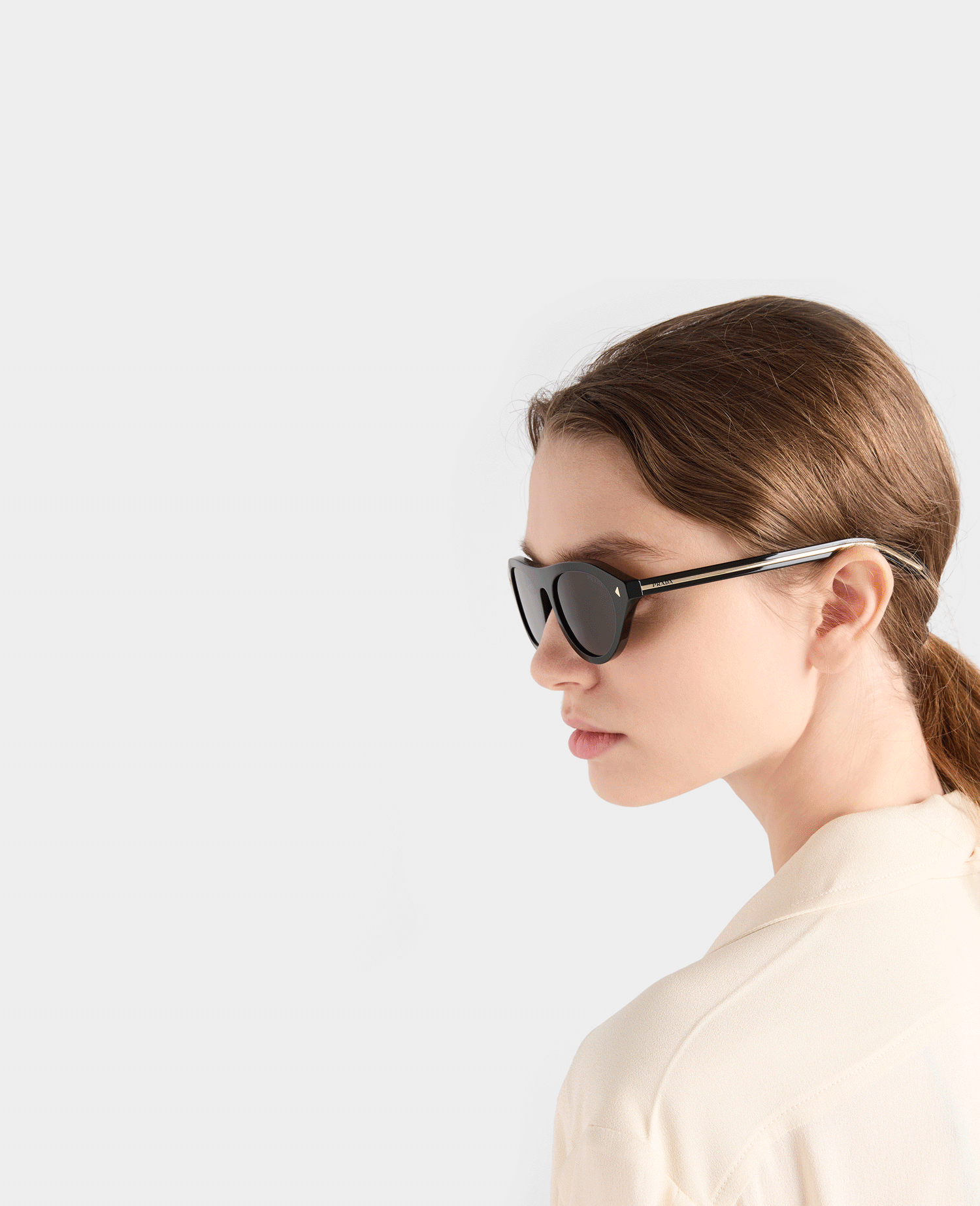 Prada Sunglasses with the Iconic Metal Plaque