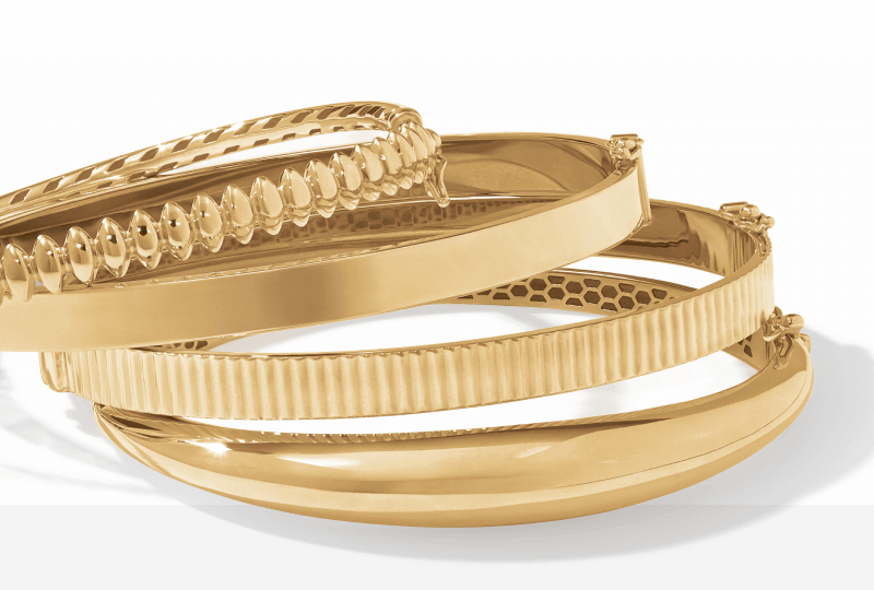 Example of Stack of Gold Bracelets