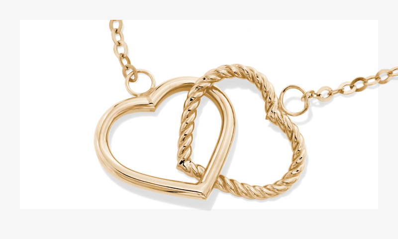 Gold necklace with two hearts
