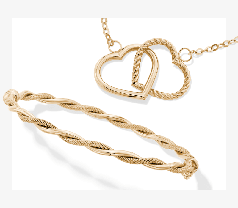 A gold bracelet and necklace