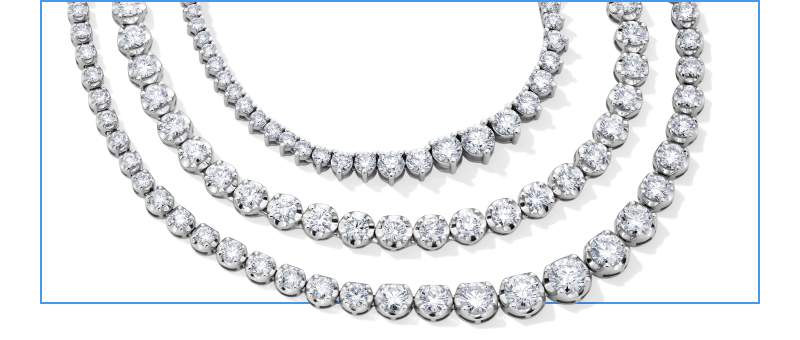 Three examples of tennis necklaces laid out flat