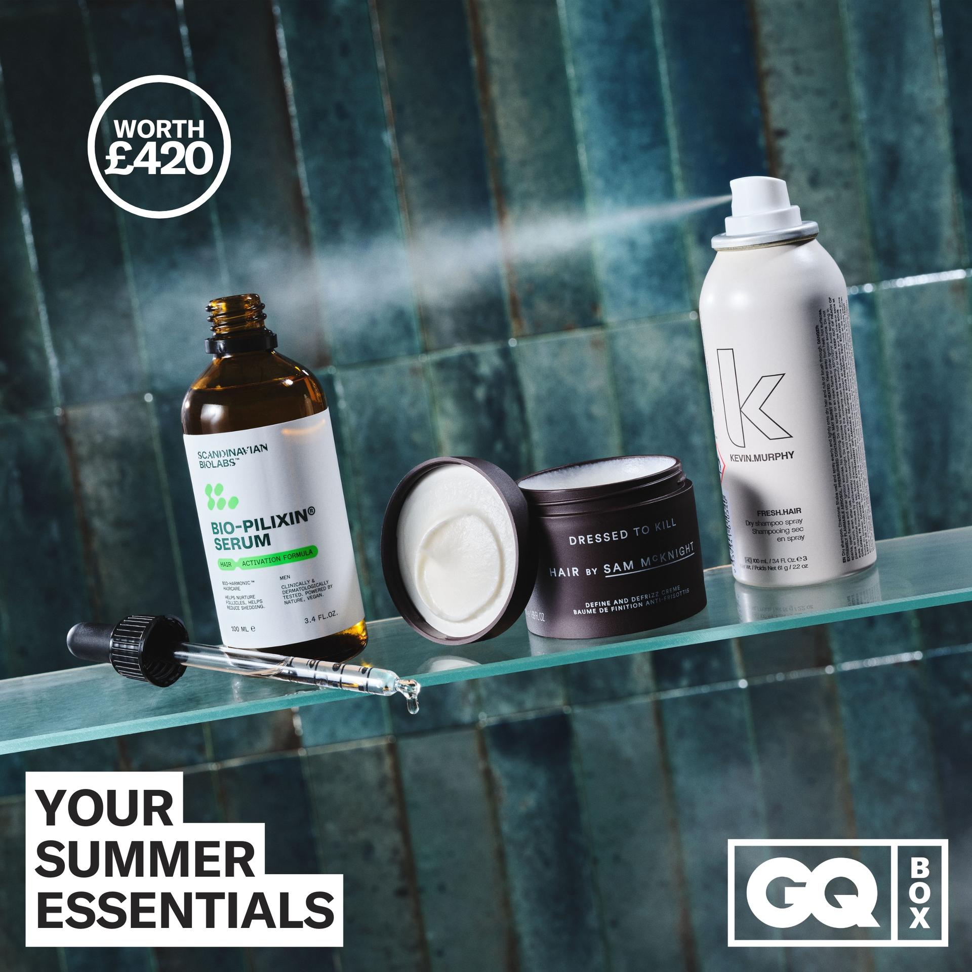 Products from the GQ Summer Box on a bathroom shelf