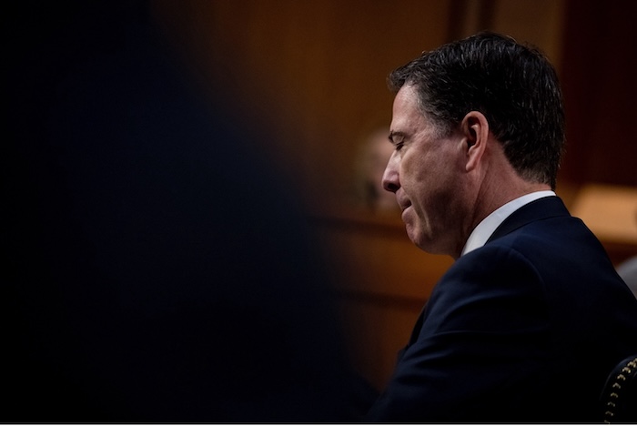 Then–FBI Director James Comey testifying on Capitol Hill on June 8, 2017. Andrew Harnik/AP