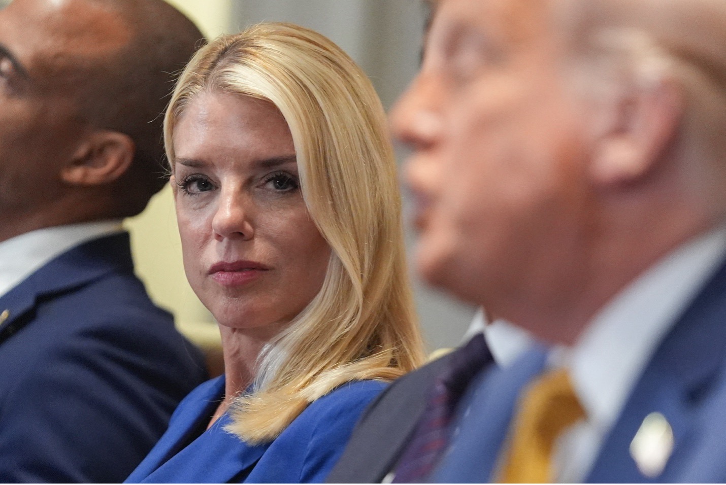 Attorney General Pam Bondi with President Donald Trump at a Cabinet meeting at the White House on Tuesday. Evan Vucci/AP