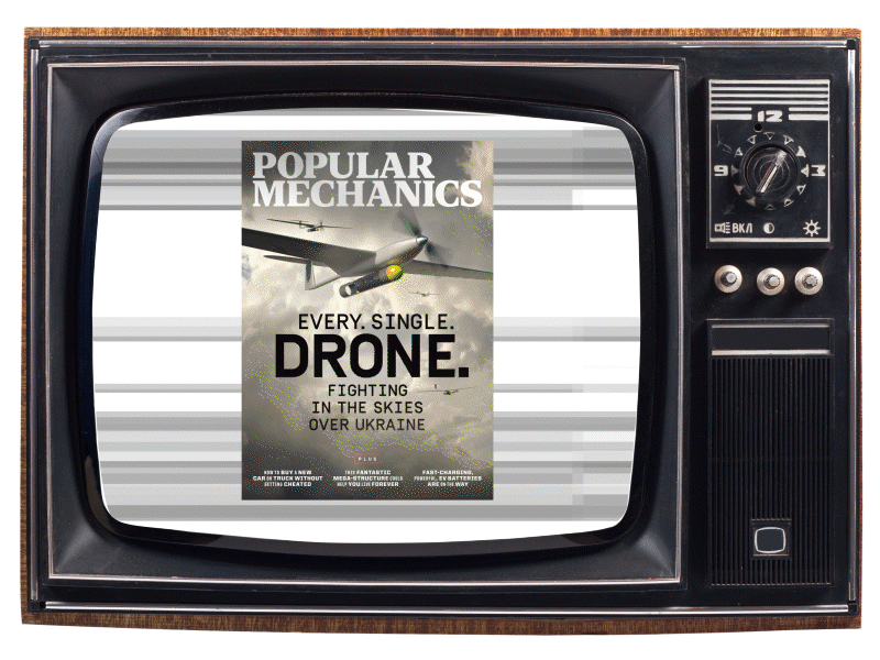 old television flickering between covers of Pop Mech digital issues