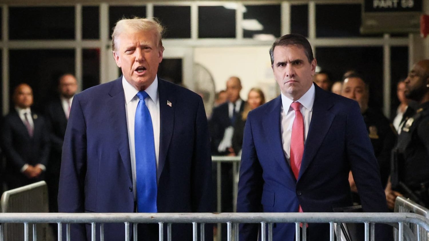 A photo of Trump and his attorney