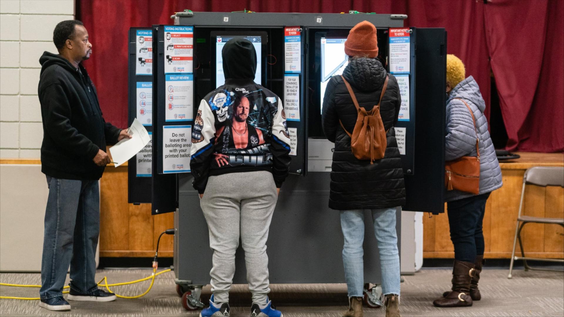 A photo of people voting 