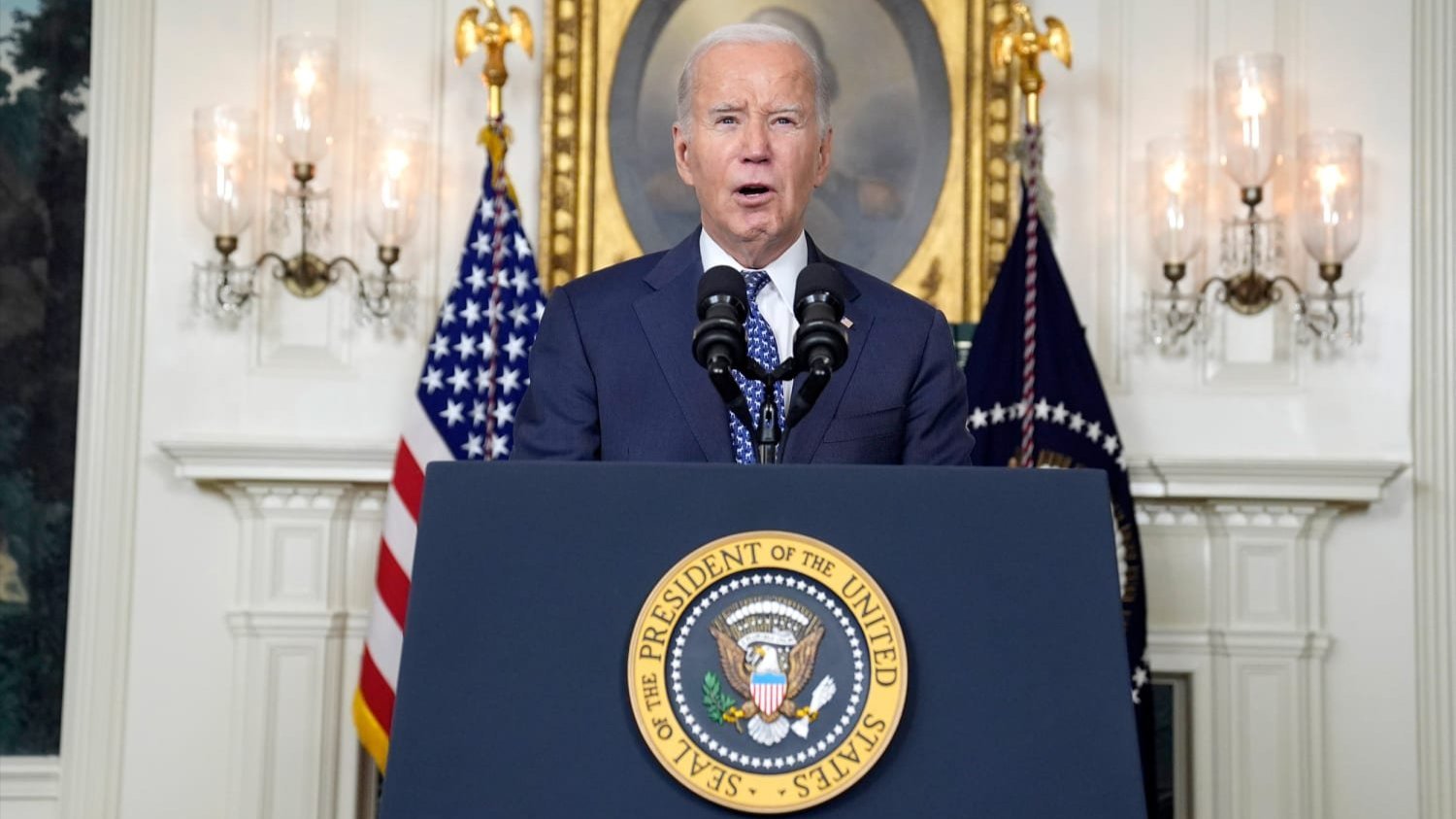 A photo of Joe Biden at a press conference