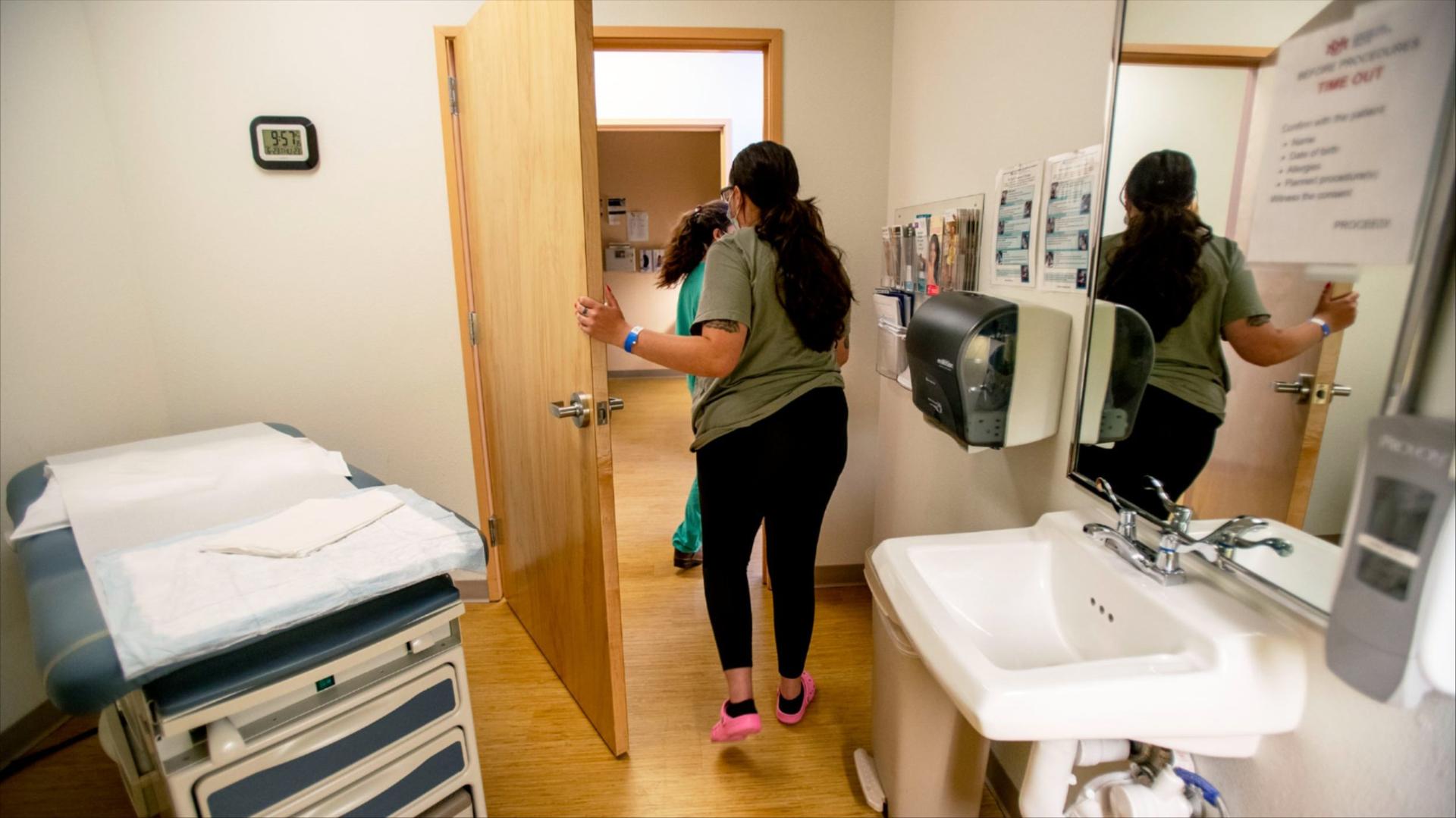 A photo of a woman at a clinic