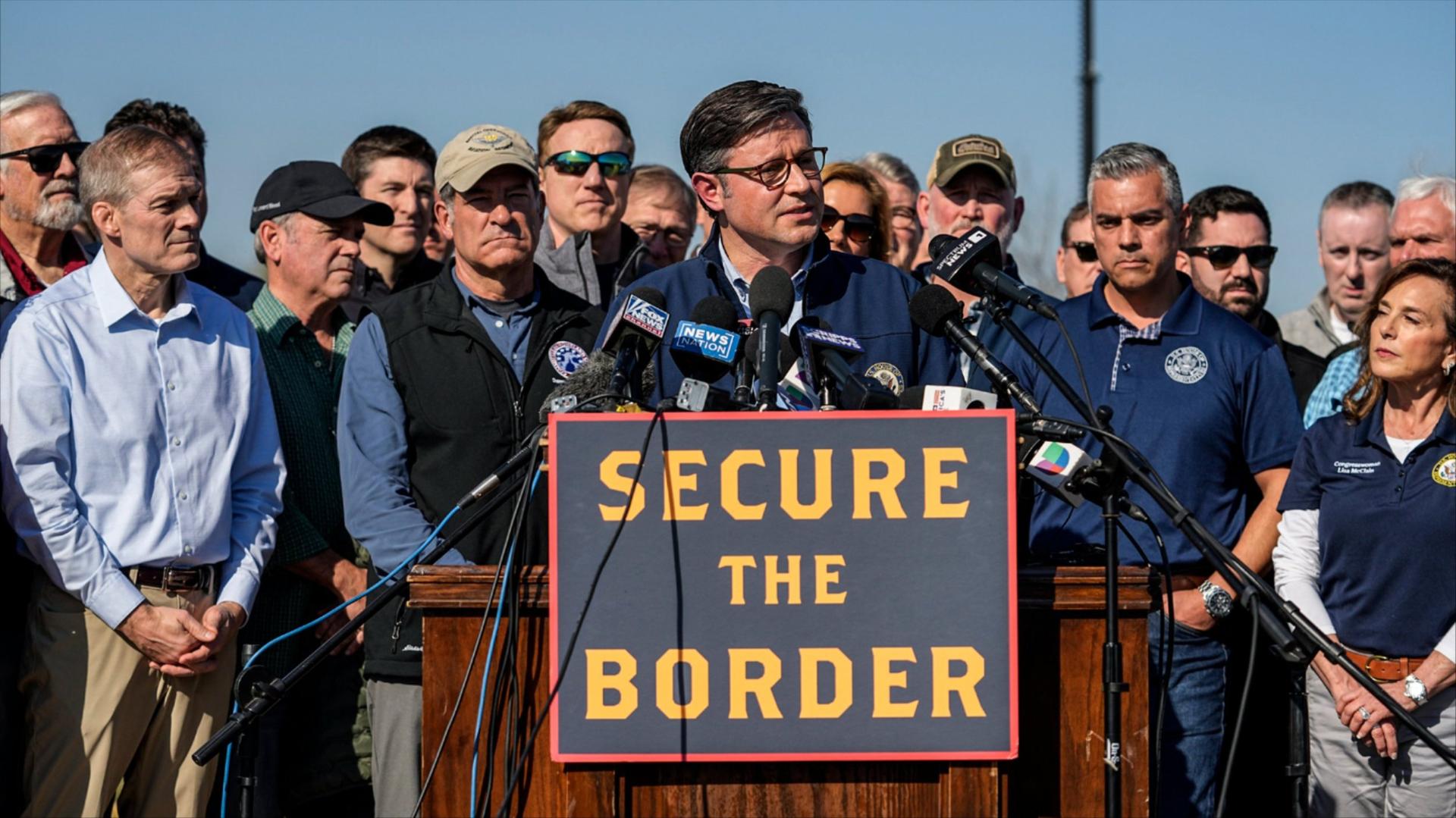 Mike Johnson at a podium