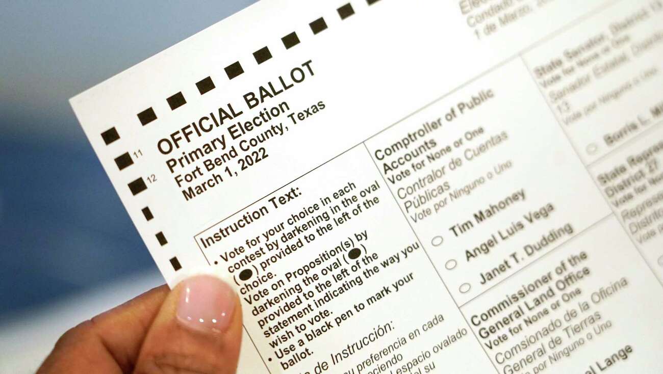 Pam Gaskin talks about her mail ballot at her home Monday, Jan. 31, 2022 in Missouri City. She advises people to fill out all the blanks even if it say one needs to be provided. She finally received her mail ballot today after multiple requests were rejected earlier this year.