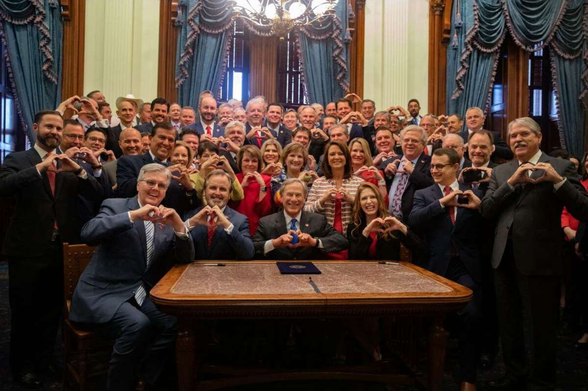 Texas Republicans celebrate the May 2021 signing of the so-called 