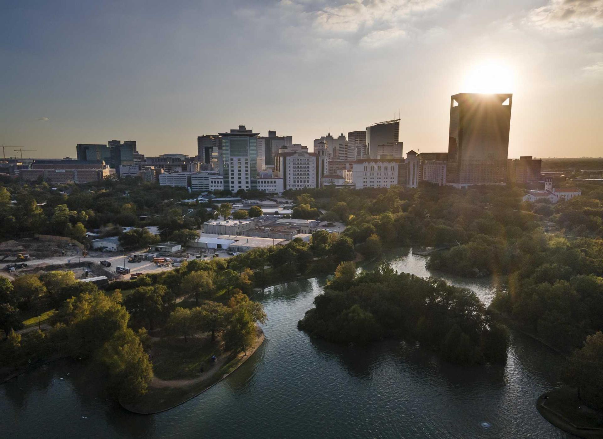 The Texas Medical Center seen from McGovern Lake in Hermann Park.