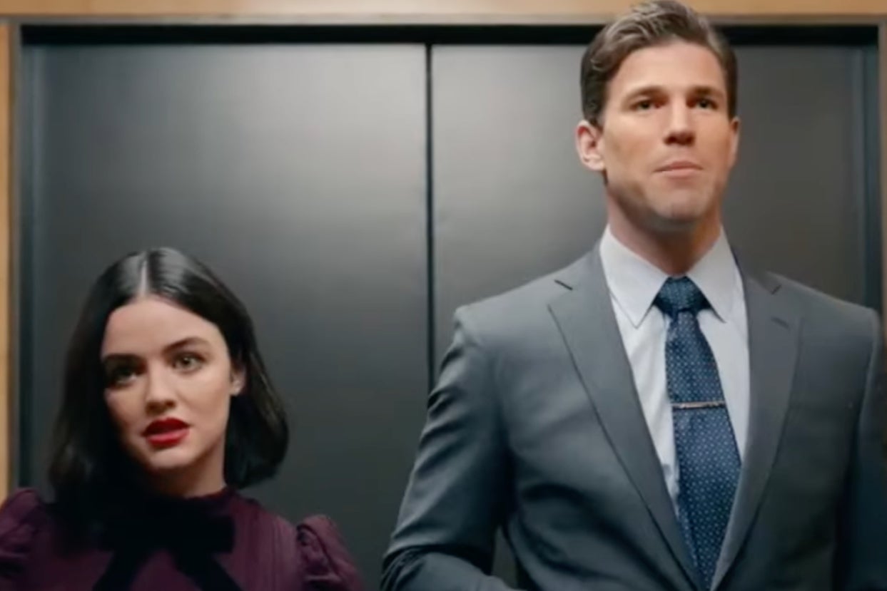 lucy hale and austin stowell stand side by side in an elevator lucy hale and austin stowell stand side by side in an elevator
