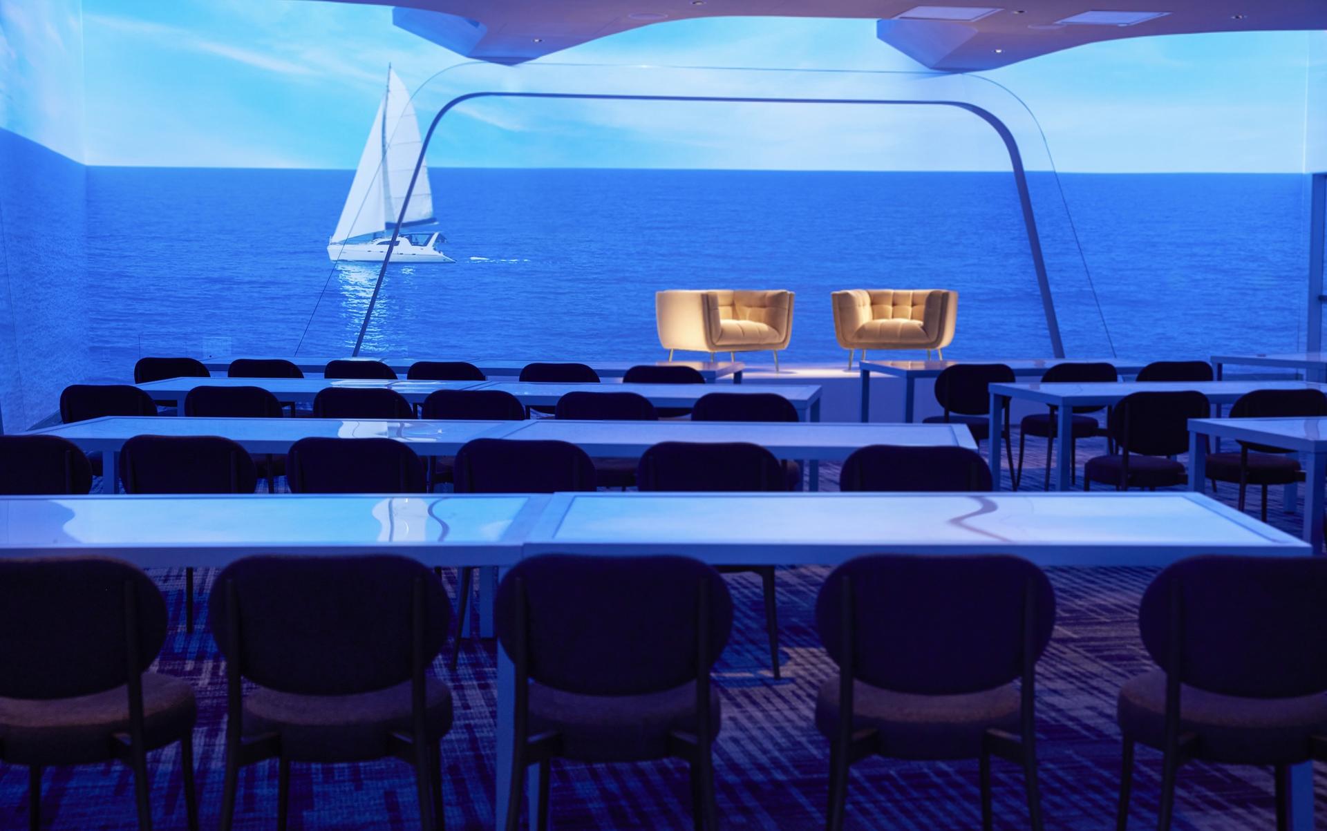  W South Beach's Ballroom with a 360-degree projection screen showing a sailboat on the ocean.