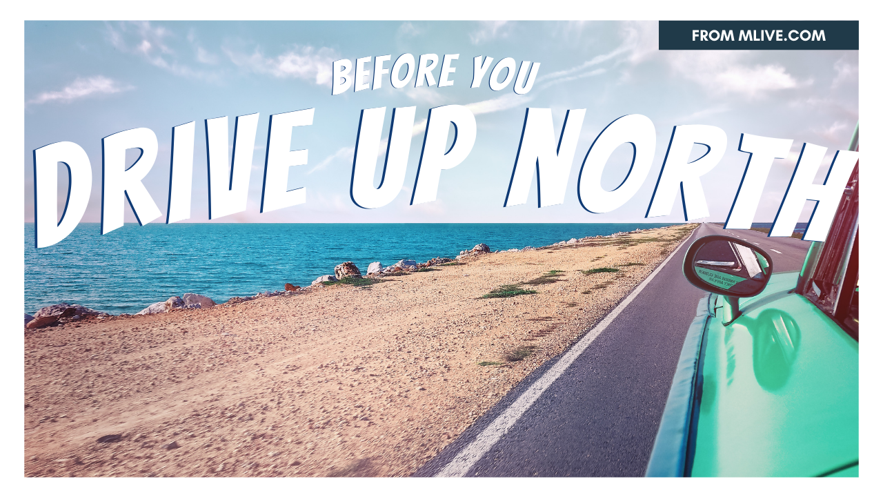 a shiny car drives down the highway with a sparkling blue lake on its left and blue skies above. The text on the image reads, ''Before You Drive Up North'' 
