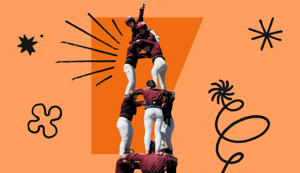 A photograph of a group building a Castell (a human tower). The photograph is surrounded by a colorful frame with scribbles.