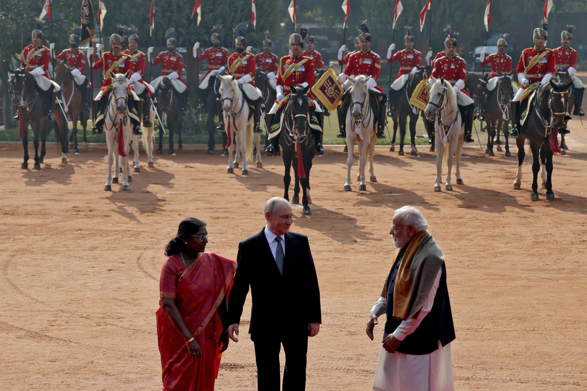 Russian President Vladimir Putin is received by India's Prime Minister Narendra Modi and India's President Droupadi Murmu in New Delhi