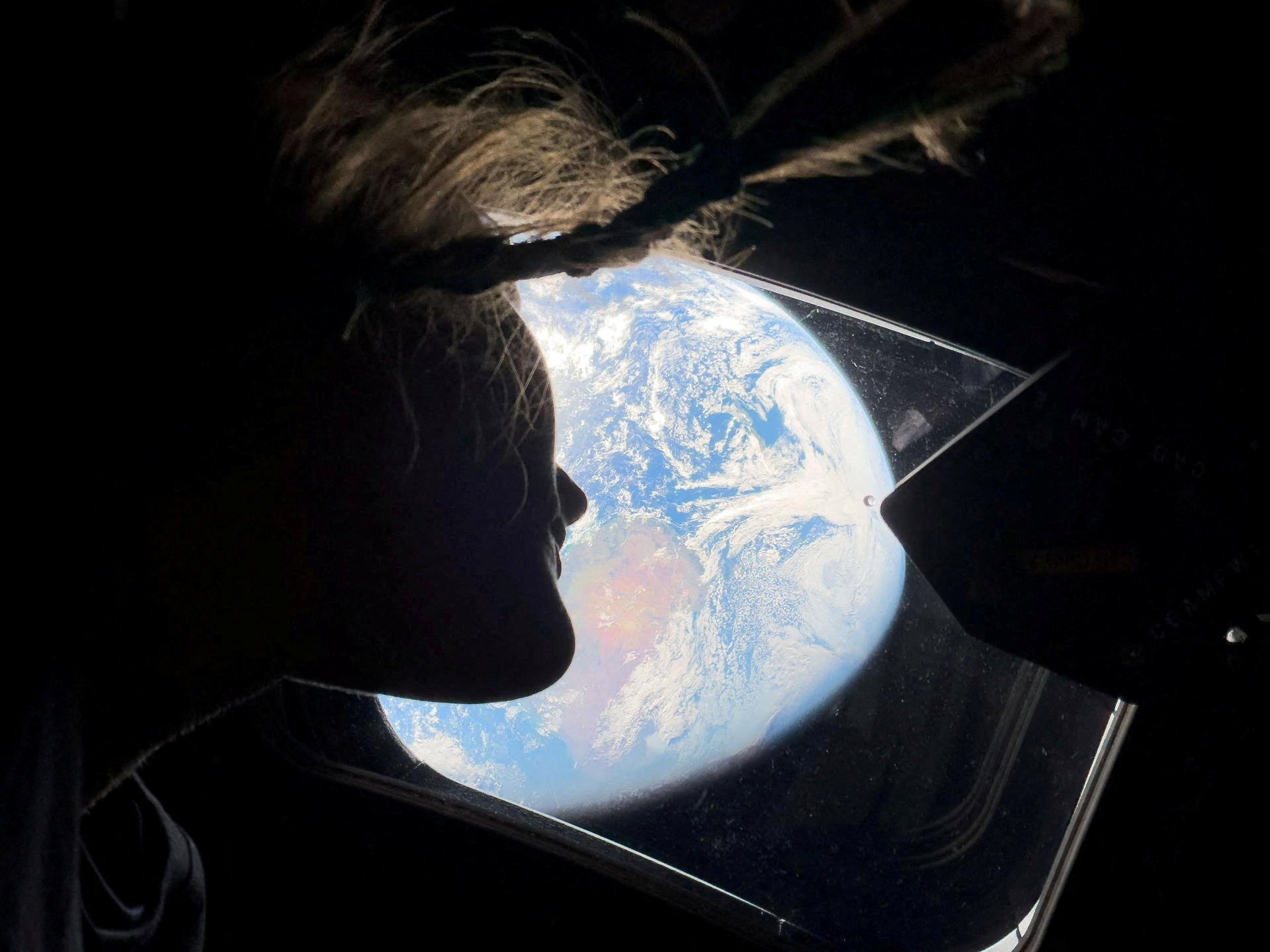 https://www.reuters.com/pictures/artemis-ii-astronauts-capture-stunning-views-earth-moon-historic-voyage-2026-04-06/