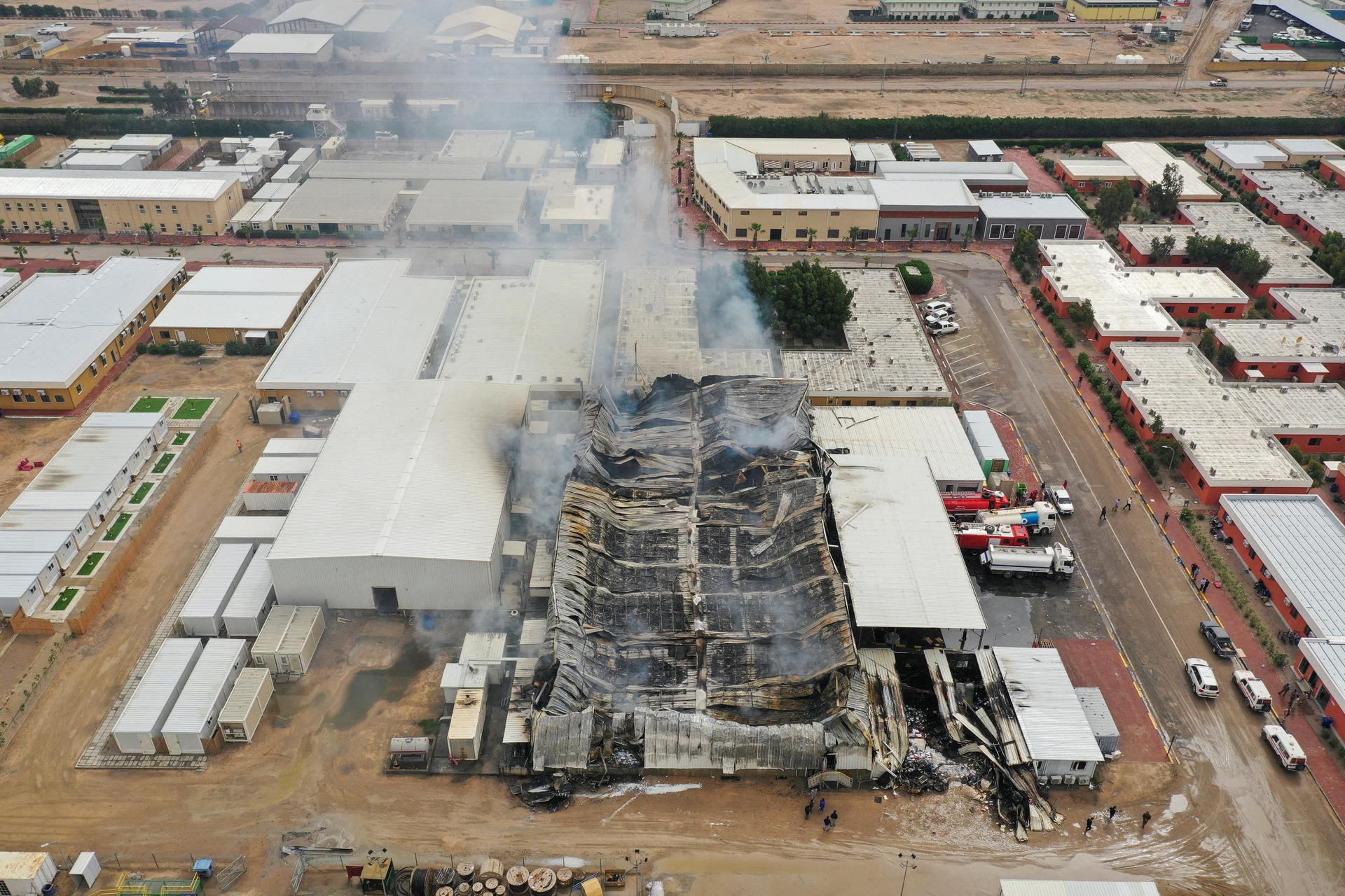 A drone view shows damage at oil storage facilities west of Basra, Iraq.