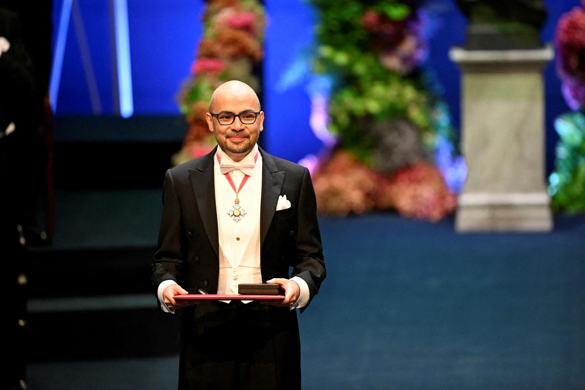 Demis Hassabis receives his award at the Nobel Prize ceremony in the Konserthuset in Stockholm, Sweden