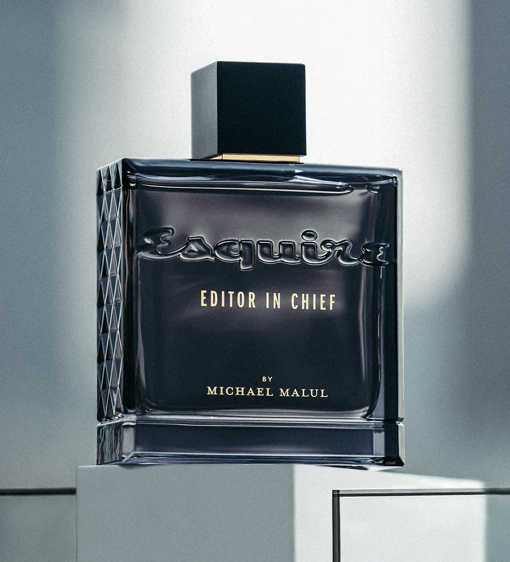 Composer, red cologne bottle 