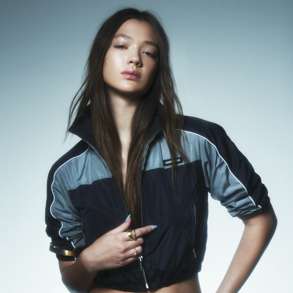 Model wearing zip up jacket