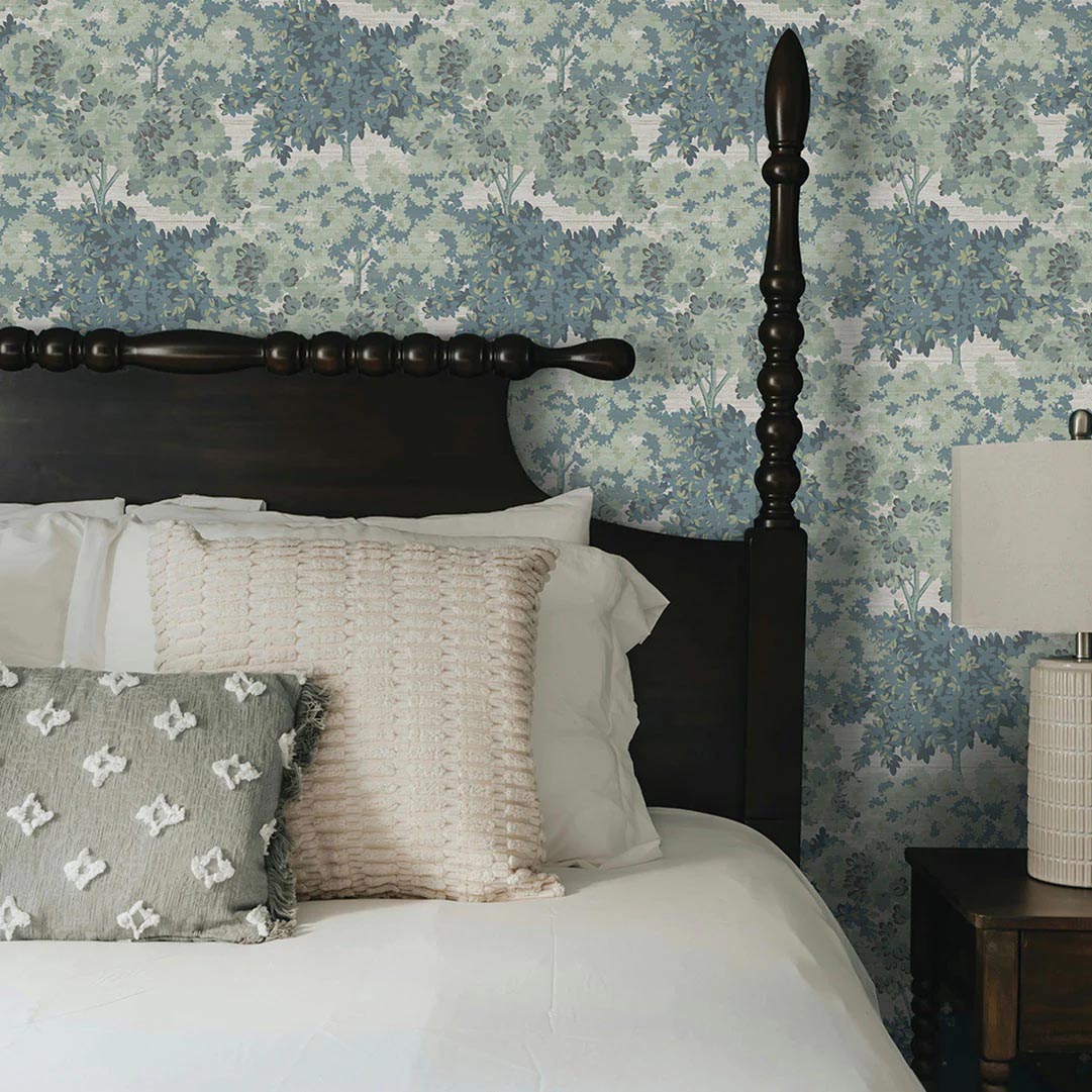 dreamy bedroom with muted blue and green scenic wallpaper
