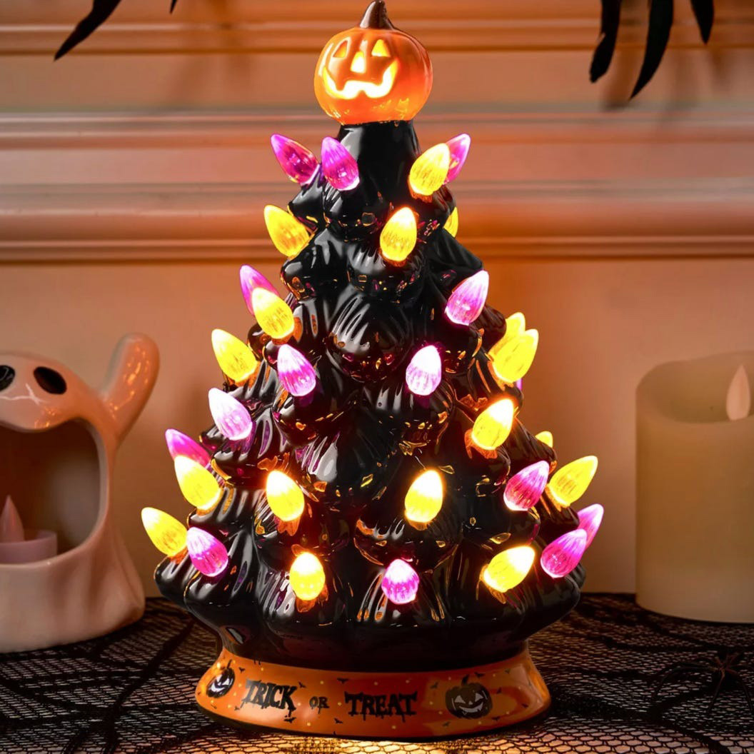 vintage style ceramic table top tree decorated in halloween theme instead of christmas