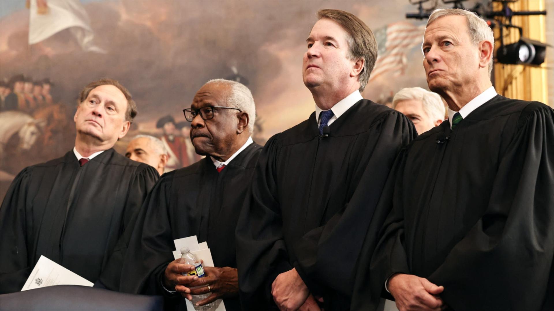 Associate Supreme Court Justices Samuel Alito, Jr., Clarence Thomas and Brett Kavanaugh and Supreme Court Chief Justice John Roberts