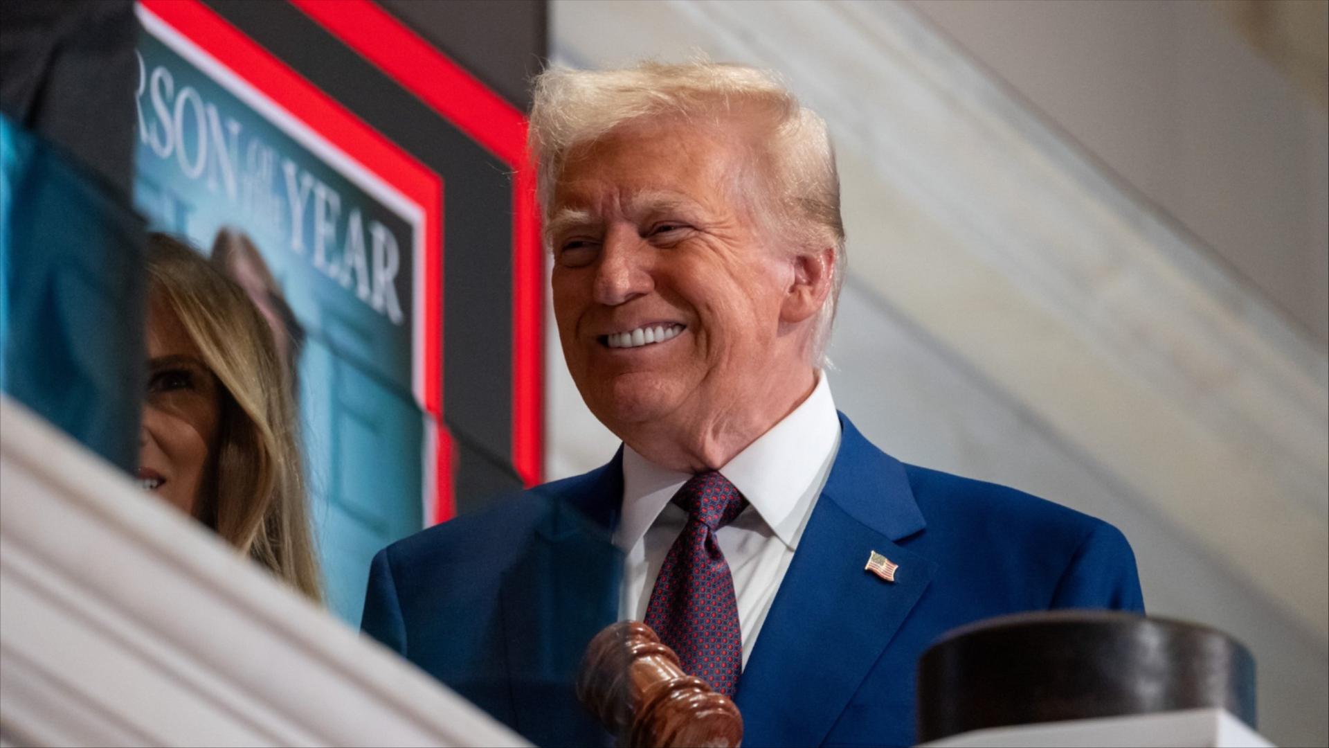 Donald Trump rings the opening bell at the New York Stock Exchange