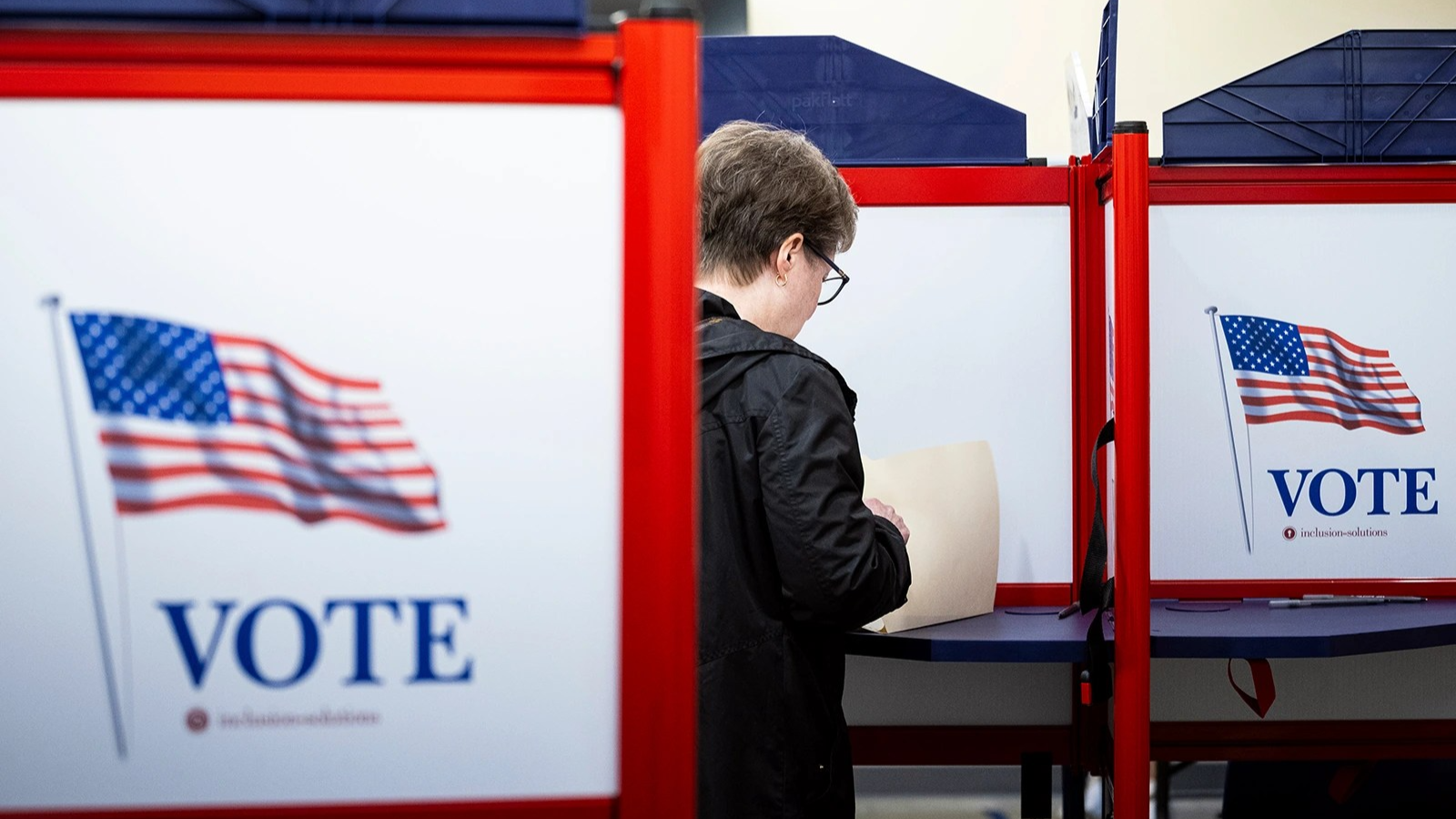A person votes at a polling location inside Burke Centre Library in Burke, Virginia, on April 18, 2026.