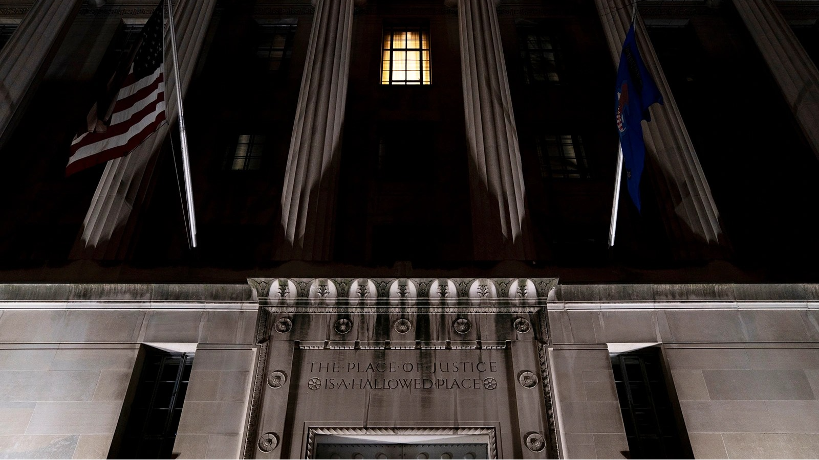The Department of Justice exterior at night
