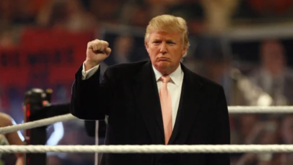 Donald Trump standing in a wrestling ring