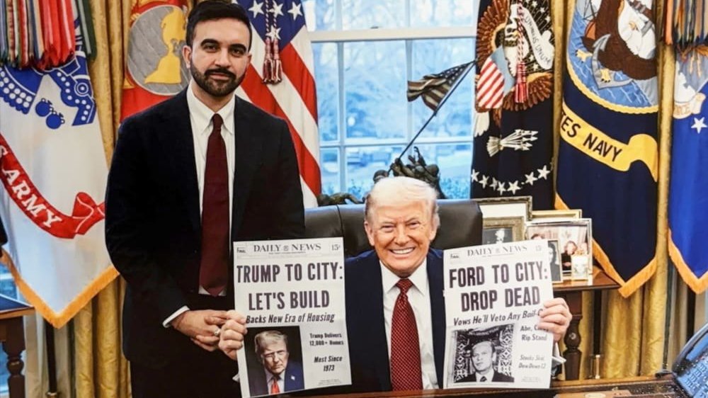 New York City Mayor Zohran Mamdani stands next to President Donald Trump as they pose for a portrait.