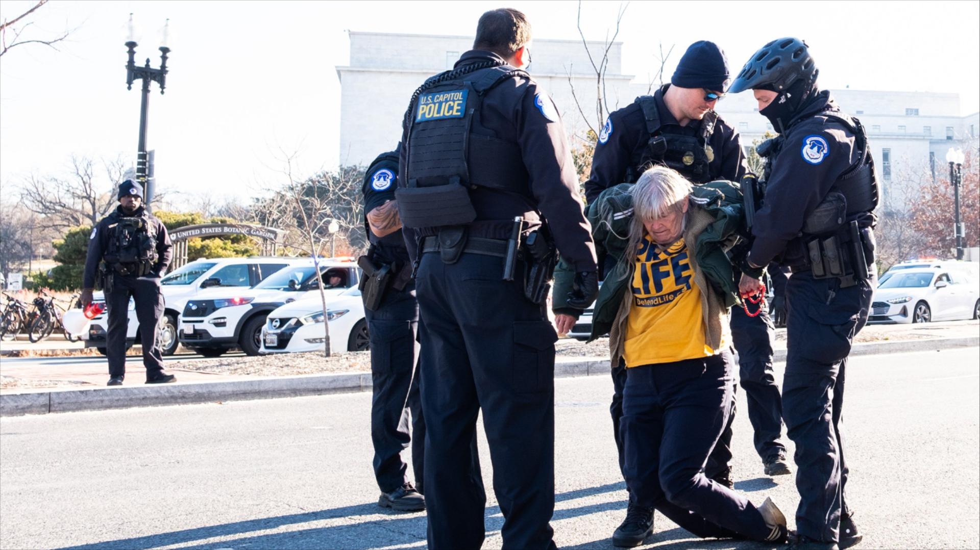Anti-abortion-rights activist Joan Bell resists arrest 