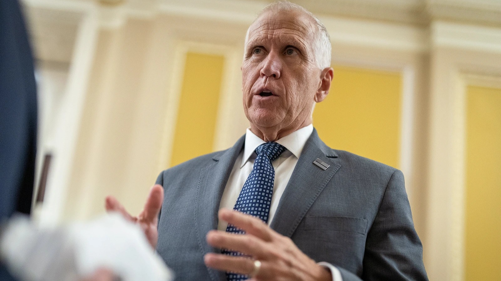 Thom Tillis gestures with his hands while speaking.