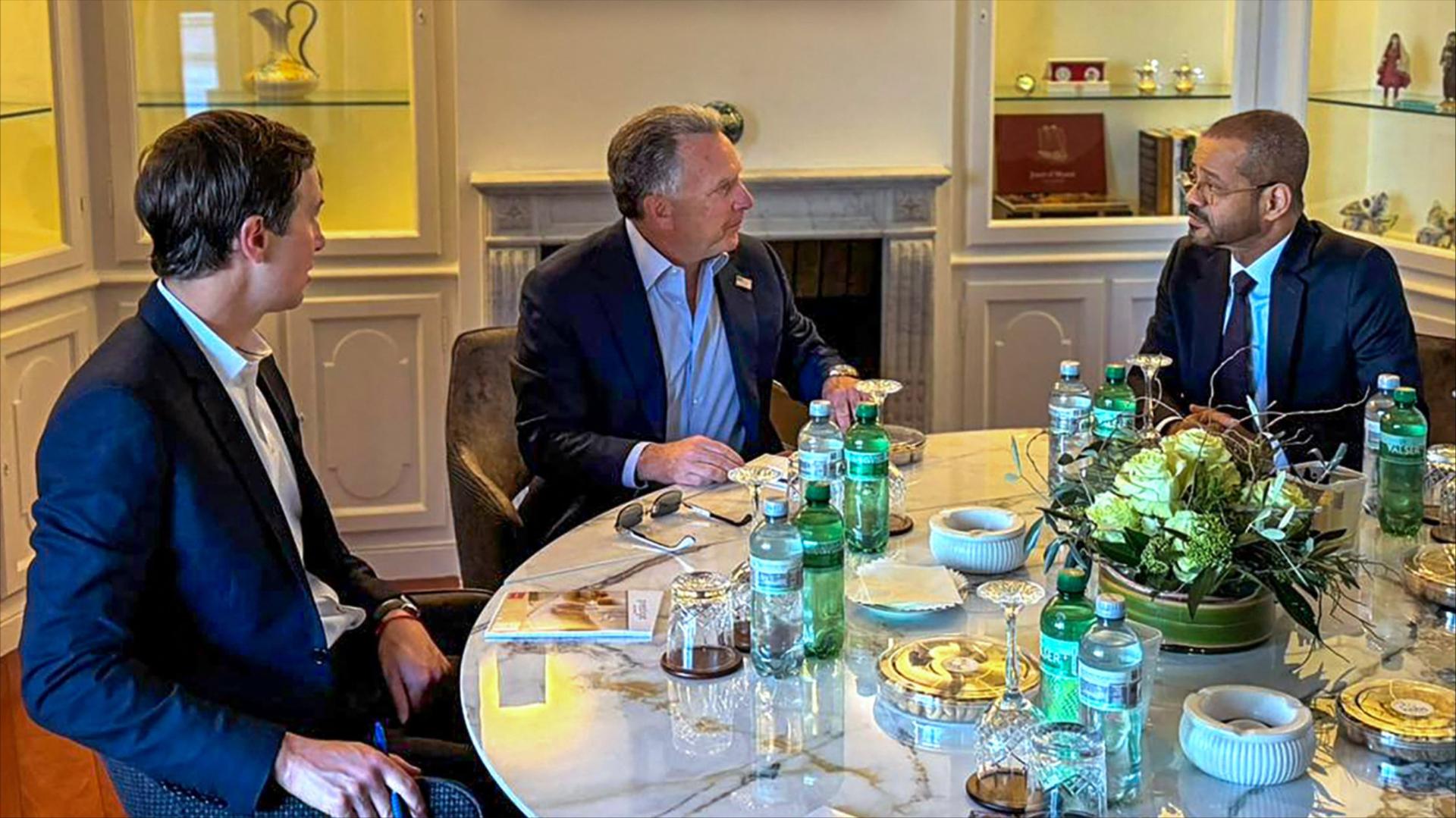 Jared Kushner, Steve Witkoff and Badr Albusaidi sit around a table