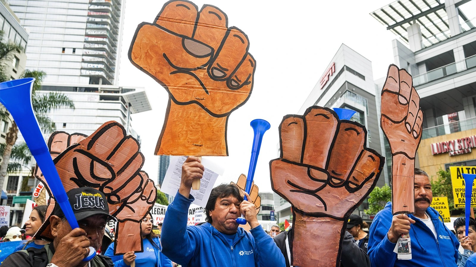 A coalition of labor groups and activists hold a May Day rally for International Workers' Day