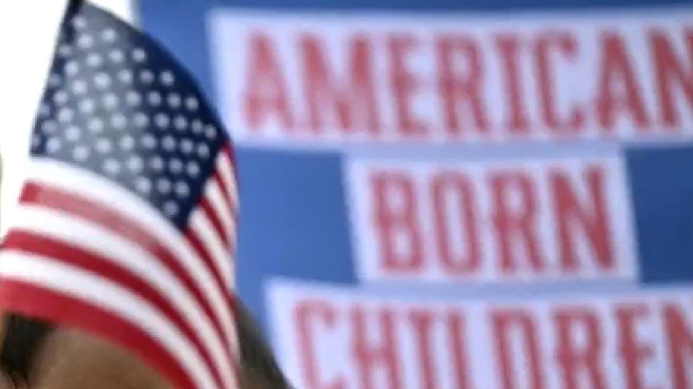 American flag and sign