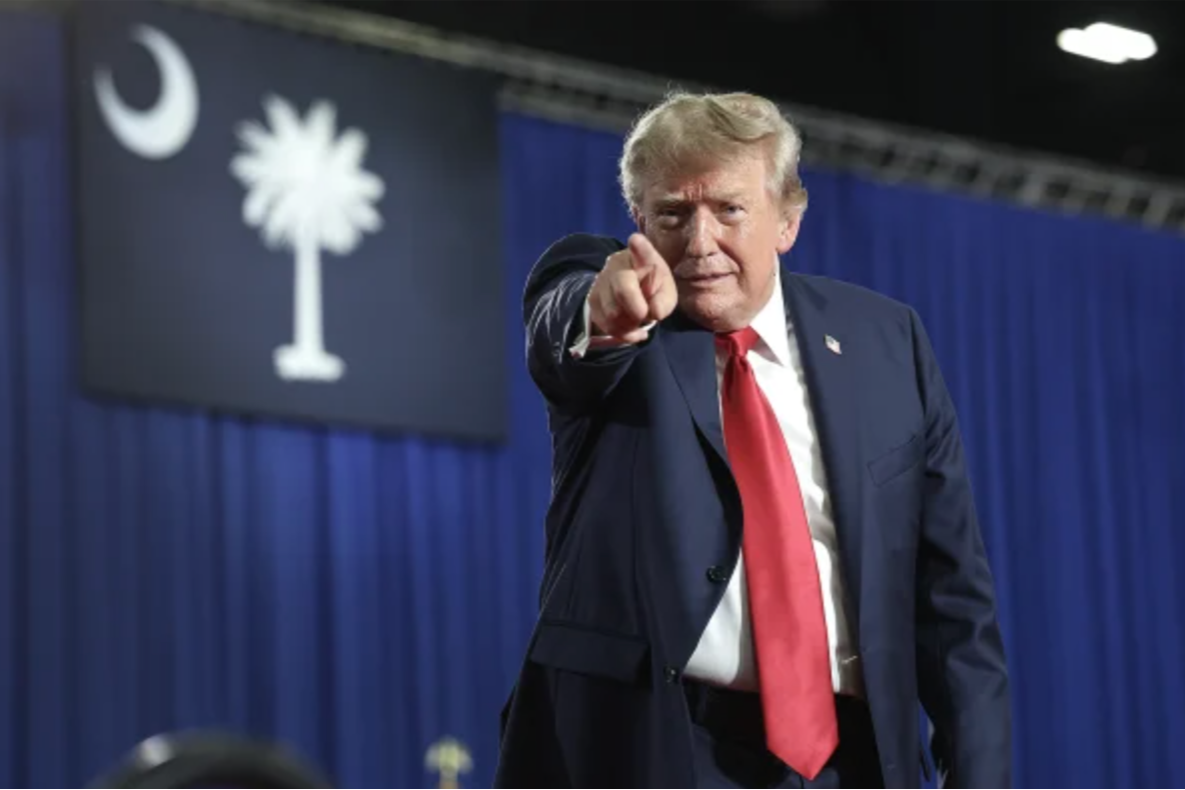President Donald Trump leaves the stage after speaking at a campaign rally with Sen. Darline Graham 